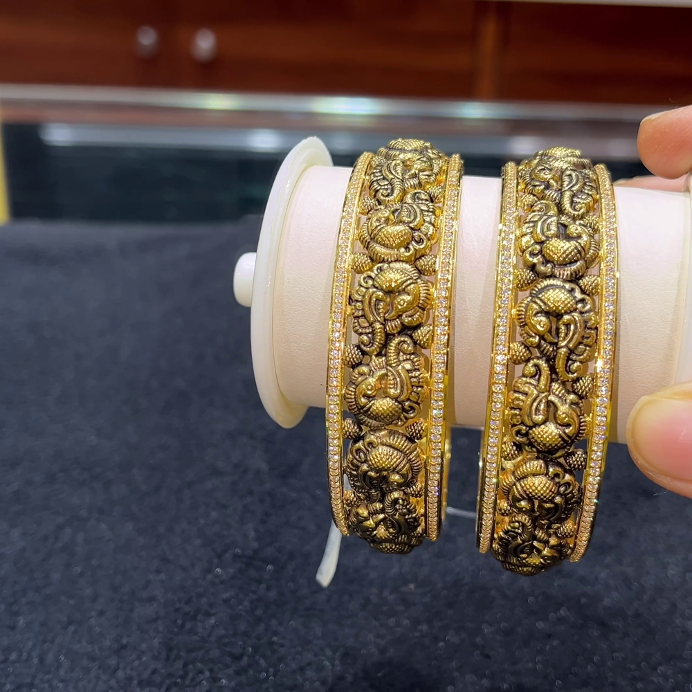 RS BROTHERS 42.668gms BANGLES 22K Nakshi