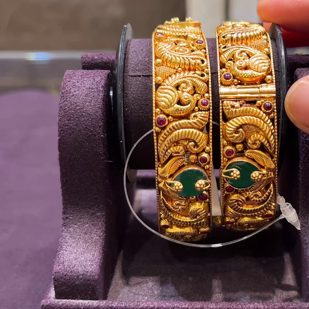 CMR 49.701gms BANGLES 22K Nakshi