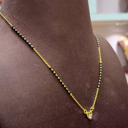 SwarnaKanchi 4.92gms SHORT BLACK BEADS 22K Yellow Gold