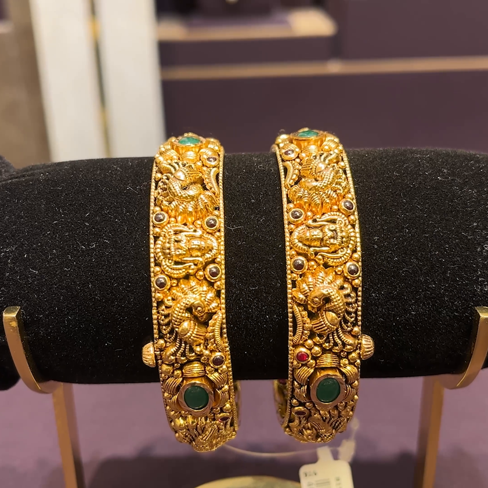 CMR 38.455gms BANGLES 22K Nakshi