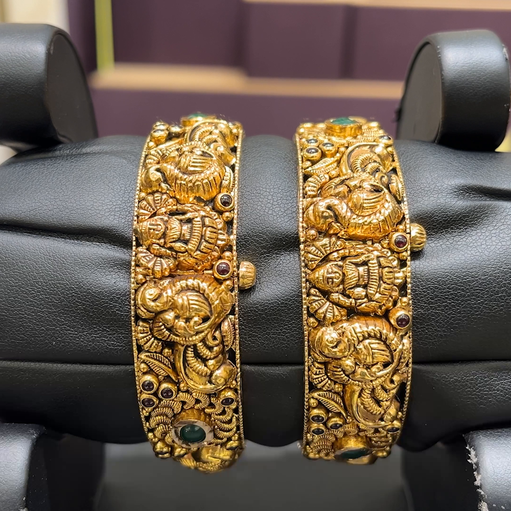 CMR 47.716gms BANGLES 22K Nakshi